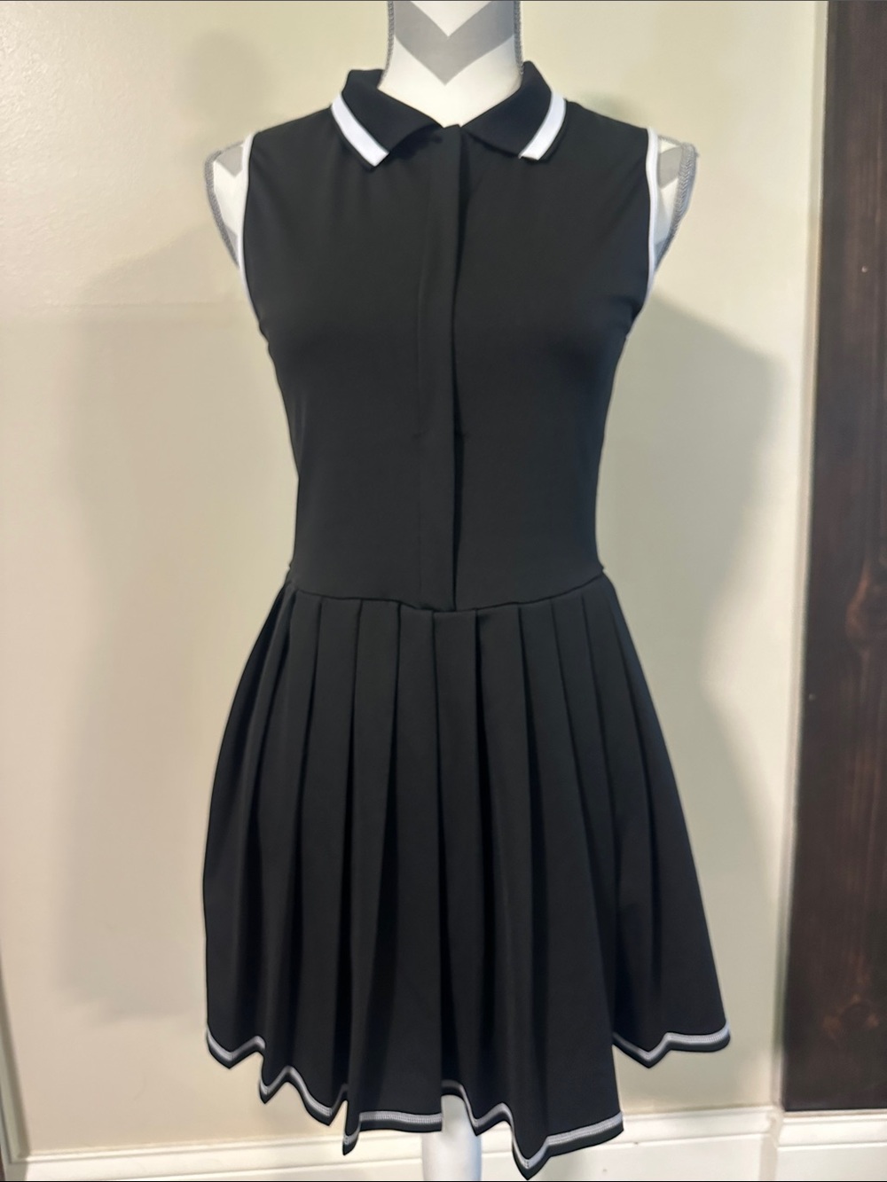 Black Sleeveless Pleated Polo Dress with White Trim